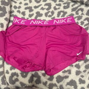 Pink Nike shorts